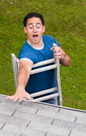 Risks man about to fall off ladder