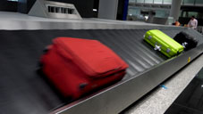 friction - suitcases on conveyor belt