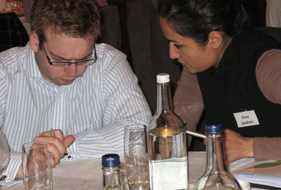 Shane Walsh and Elnaz Javaheri deep in discussion
