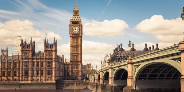 Image of Big Ben, Houses of Parliament and Westminter Bridge with blue skies