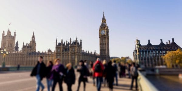 Crowd of pedestrians on Westminster bridge with Big Ben in the background