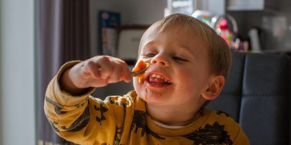 Toddler-gleefully-eats-baked-beans-How-COVID-19-is-affecting-food-security-proj