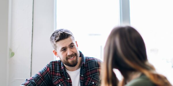 A social worker talking to a teenage girl: Developing family engagement models with front-line youth justice practitioners