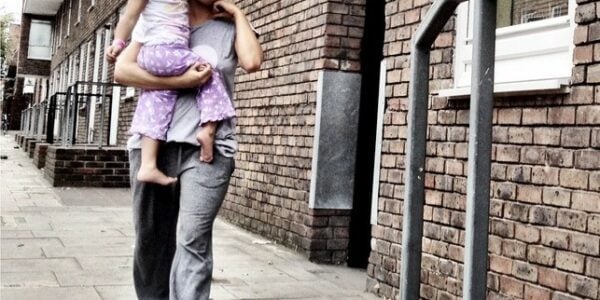 COVID Realities: Woman carries daughter home