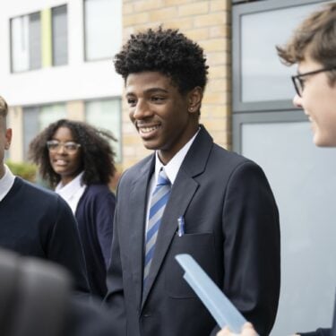 Group of teenage boys at school in uniform