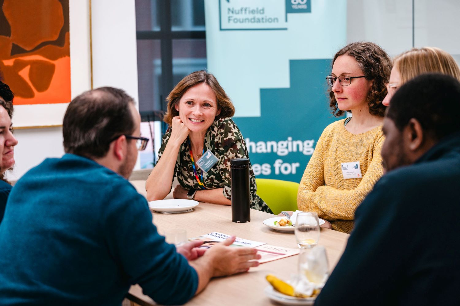 Roundtable discussion at ECR event3 Six people discussing ideas at the early career researcher event