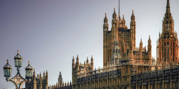 London's Houses of Parliament on a clear day at sunrise